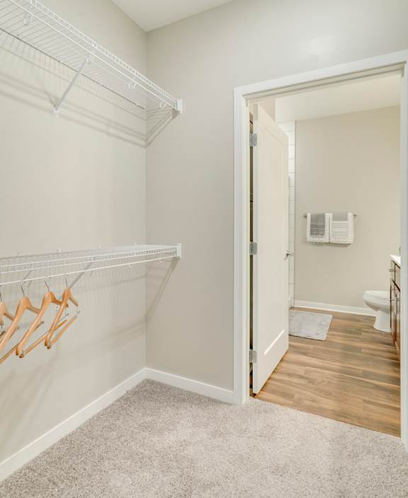Large walk-in closet at Ascend at Woodbury apartments in MN.