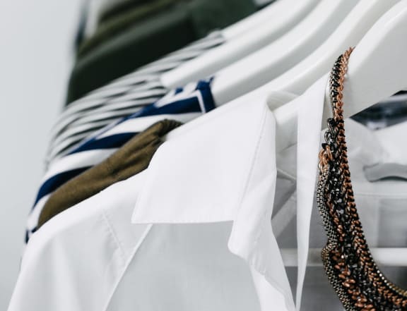 a row of shirts on a rack
