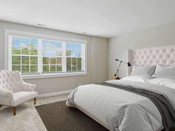 Bedroom with a large window