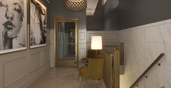 a lobby with a chair and a lamp and a staircase at East 4th Street, Ohio, 44115