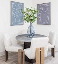 Model dining room at Saltaire Apartment Homes in Santa Rosa Beach, FL
