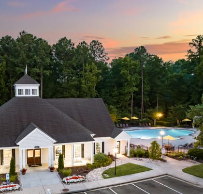 A rendering of a church with a swimming pool at sunset