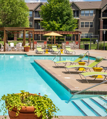Pool with Lounge Chairs and Sun Umbrellas