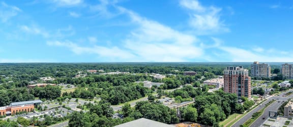 a view of the city from the top of a building