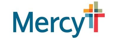 The image shows a logo with the word "Mercy" and a graphic of a cross with multiple colors.