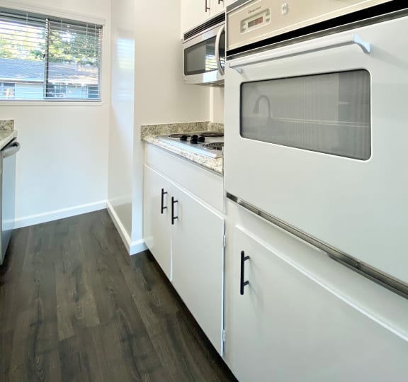 Kitchen with Oven and Hardwood Floors at 2120 Valerga in Belmont, 94002
