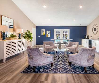 the preserve at ballantyne commons living room with a table and chairs