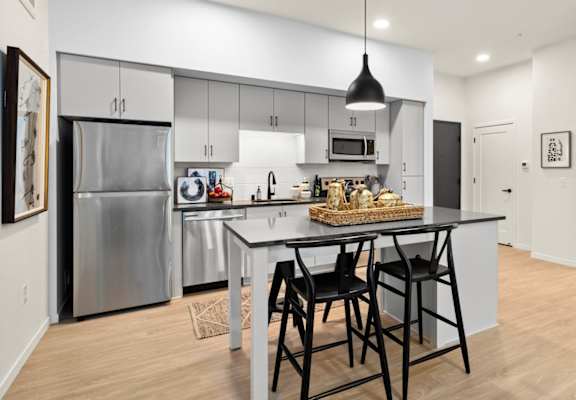 Fitted Kitchen With Island Dining at The Hill Apartments, Saint Paul, 55103