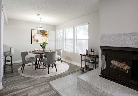Dining Area and Fire Place at Orange Tree Village Apartments in Tucson Arizona June