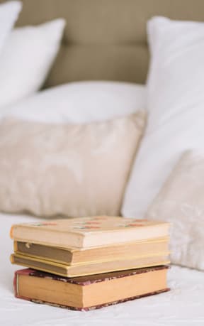 Books near pillows