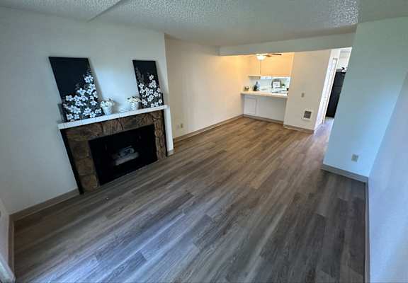 Clearwater Square Apartments in Kennewick, Washington Living Room with Fireplace