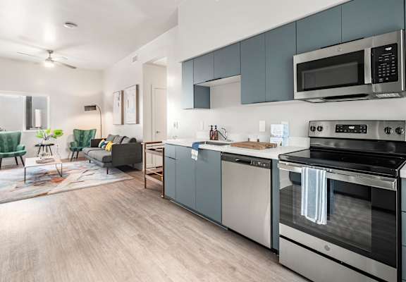 Kitchen and living room at SECOND AVE COMMONS | BRAND-NEW, Mesa, Arizona