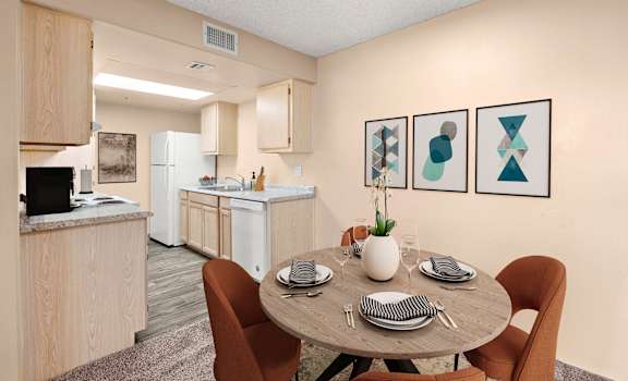 Dining and kitchen area at Silver Cliffs Apartments in Bullhead City Arizona