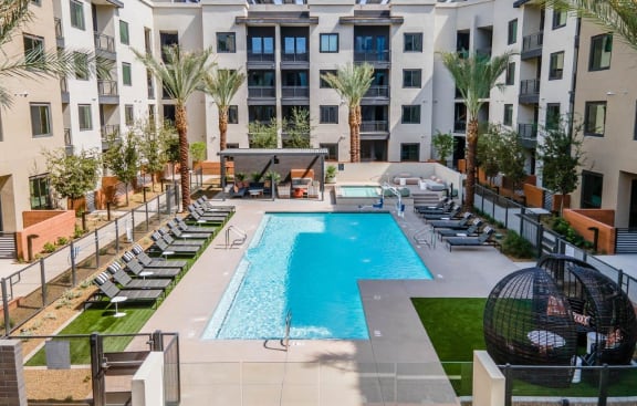 Aura Central Apartments Pool Area Courtyard with Building Exteriors