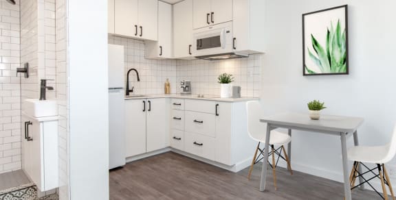 The Imperial Apartments Model Studio Kitchen and Dining Table