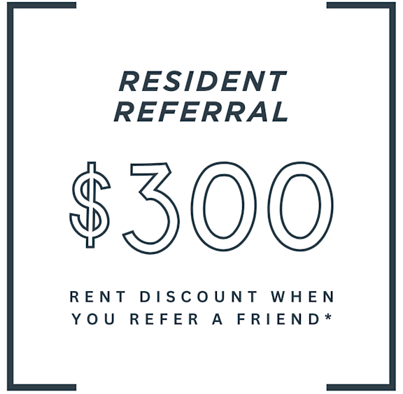A sign offering a $300 discount for referring a friend.