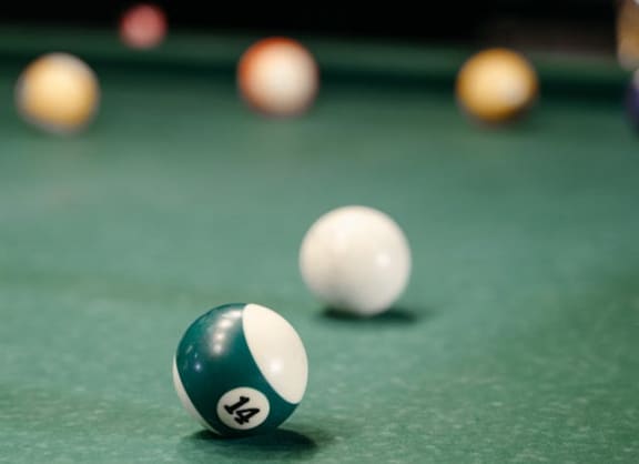a billiard ball on a pool table