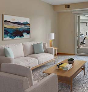 a living room with a white couch and a coffee table