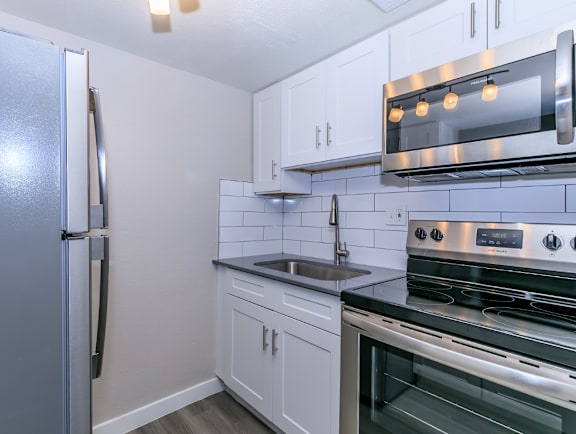 Apartment kitchen — representative home at Tides on East Cactus.