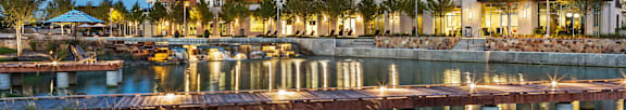 Discovery at the Realm Building Exterior and Lake at Night