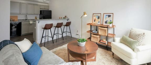 Resident lounge with comfortable chairs and table