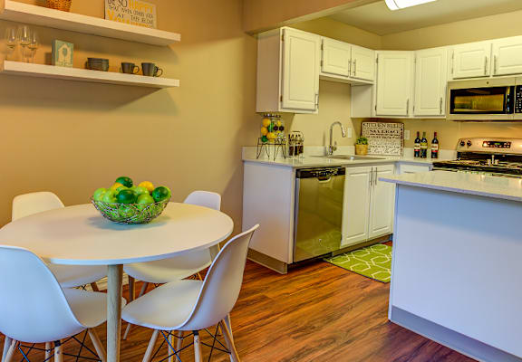 Kitchen and dining at Commons at Hawthorn Village Apartments, Oregon, 97124