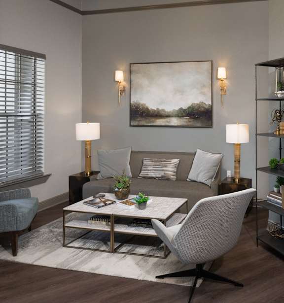 a living room with a couch and a tv