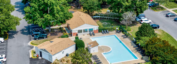 an aerial view of a hotel with a swimming pool and parking lot at Ridgewood Club Apartments, Virginia Beach, 23452