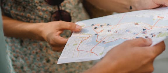 a woman holding a map