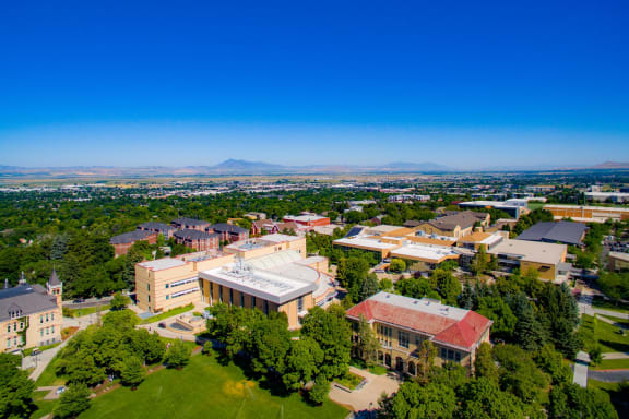 A bird's eye view of a campus with a large building in the center. at The Alloy at Geneva, Vineyard, UT, 84058