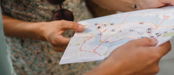 a woman holding a map