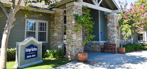 Vintage Gardens rental office exterior and sign