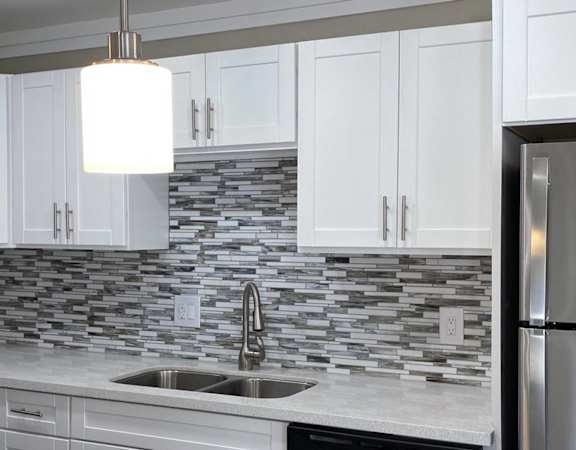 Kitchen with custom counters and cabinets