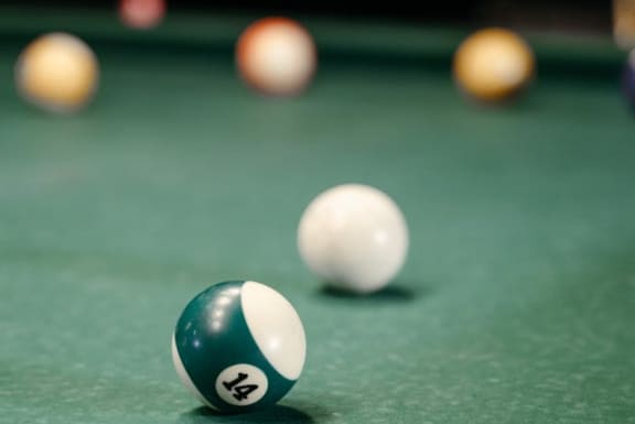 a billiard ball on a pool table