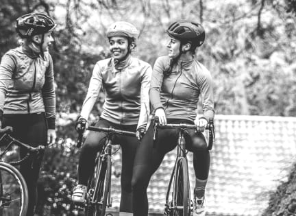 Group of 3 Women in Cycling Gear on Bicycles