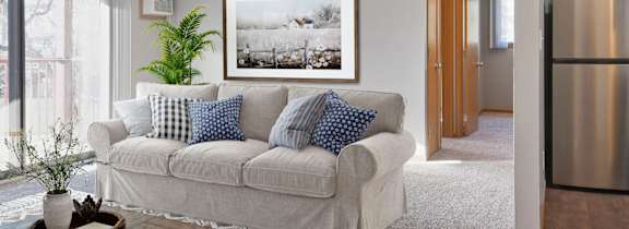 St. Louis Park, MN Courtyard |a living room with a couch and a table
