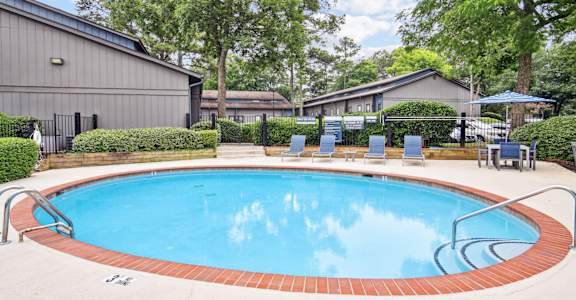 Inviting and refreshing pool area at Pine Village North in Smyrna, GA