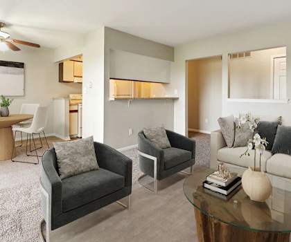 a living room with a couch and a table
