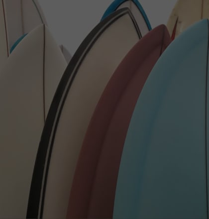 Row of Different Colored Surfboards