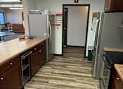 Thumbnail 10 of 18 - Community Room Kitchen View