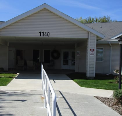 The image shows a building with the number 1140 on it.