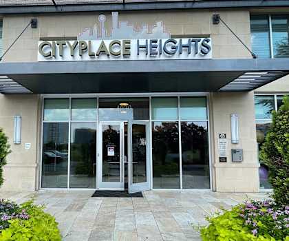 The exterior sign and building of Cityplace Heights. 