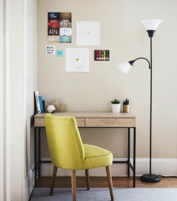 a desk with a chair and a lamp in a room at Groves at East Tabor, Fairfield, CA, 94533