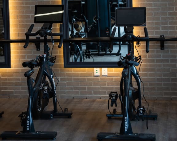 a couple of bikes in a gym