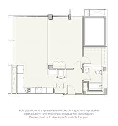 A floor plan of a one-bedroom apartment with a large walk-in closet at Liberty Tower Residences.