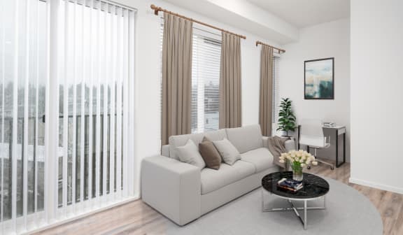 a living room with a couch and a table at The Loop at Green Lake, Washington, 98115