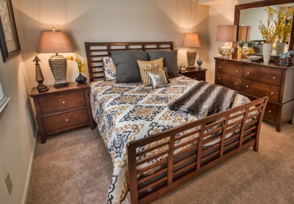 Executive Lodge Apartments Bedroom in Huntsville, AL