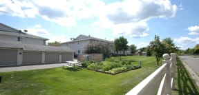 Image of the lush and beautifully landscaped grounds of Monticello Village Apartments.