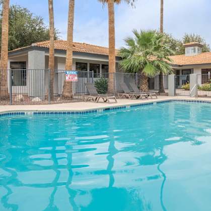 Mission Tierra Apartments in Tucson, Arizona Pool with Lounge Chairs