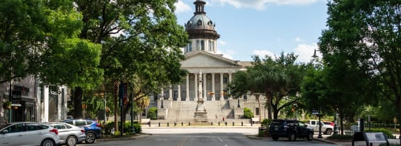 the courthouse in the middle of a city street
